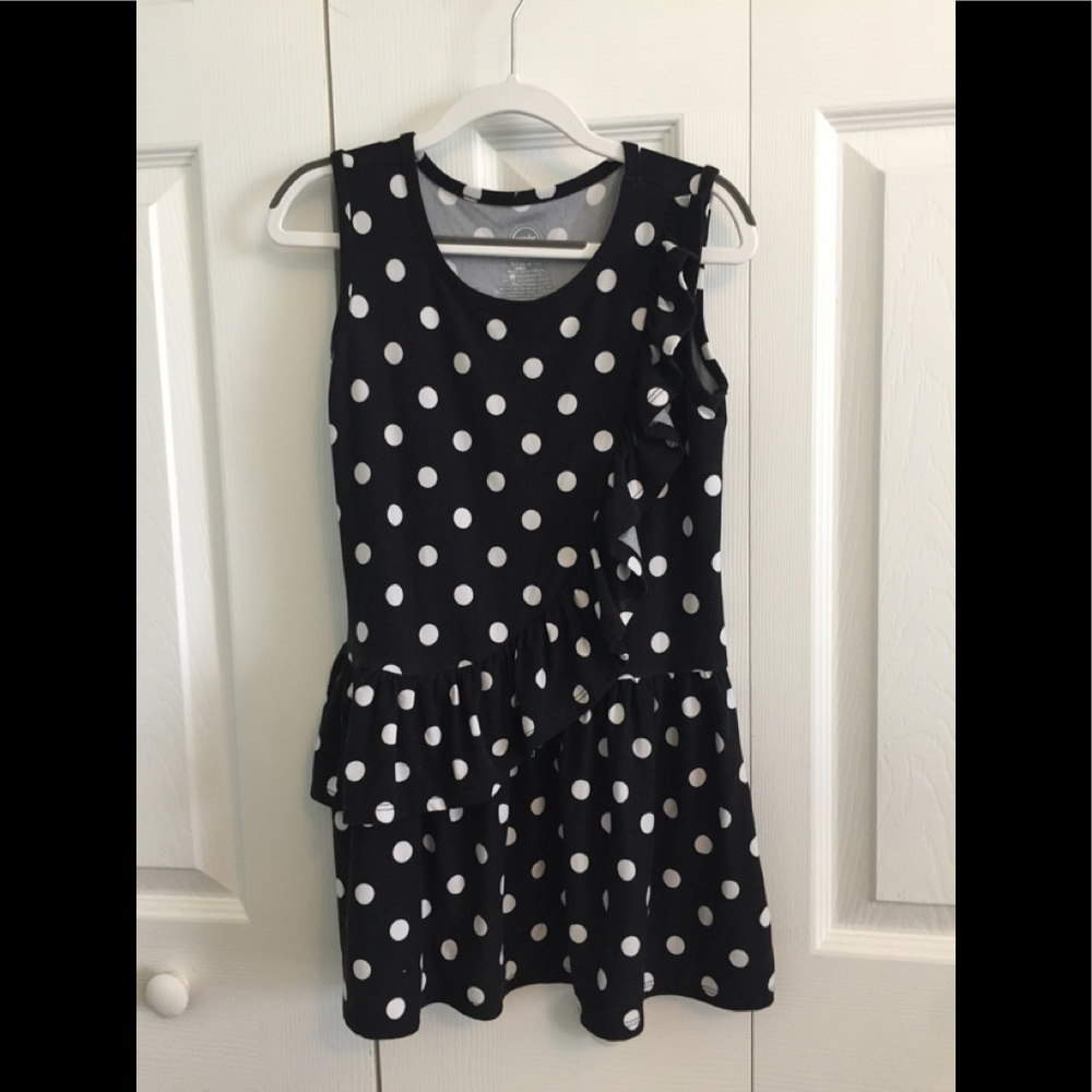 Ruffled black and white polkadot dress.